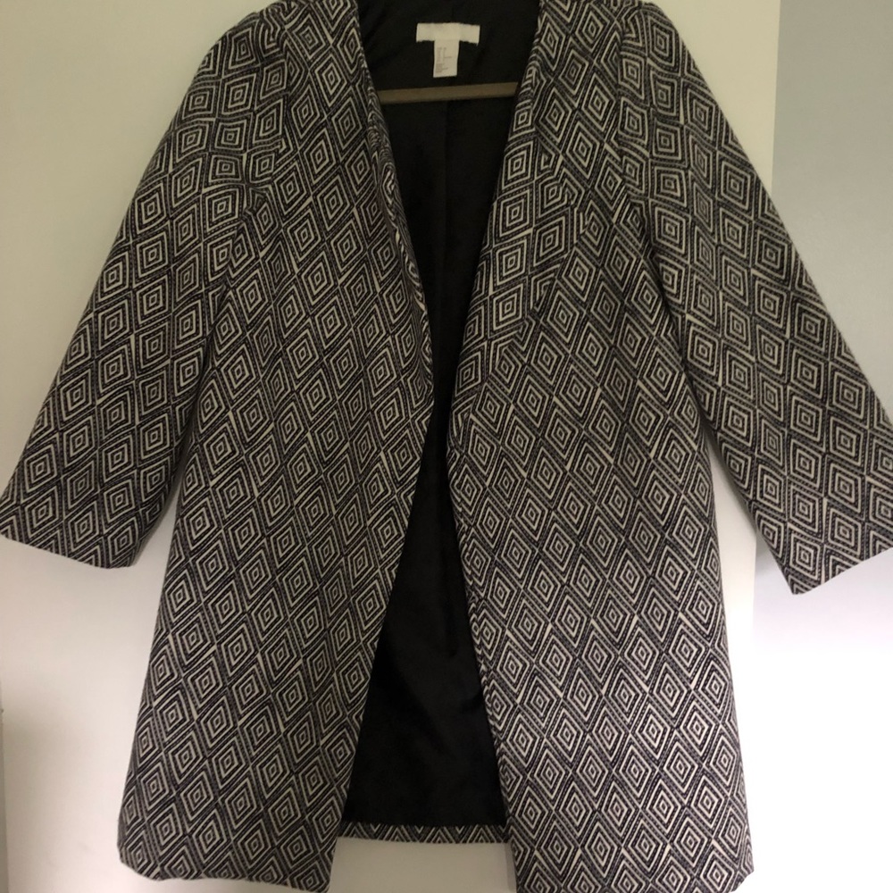 Geometric three quarter length coat